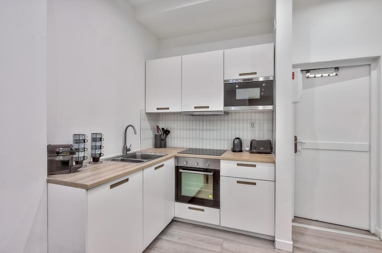 35 - Luxury Flat Grands Boulevards Parigi Esterno foto