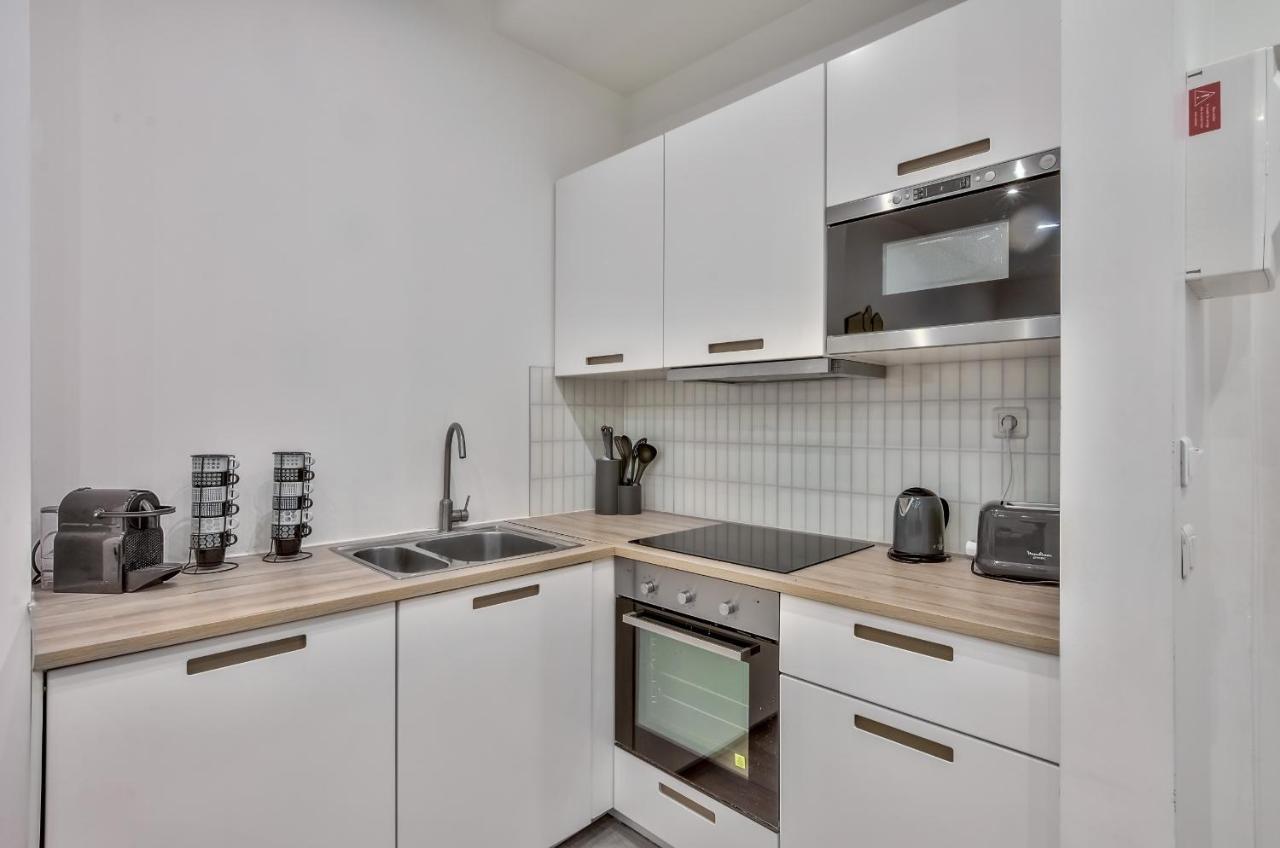 35 - Luxury Flat Grands Boulevards Parigi Esterno foto